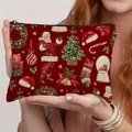 Deep red Christmas linen zipper pouch with festive patterns held by a model - Santa Claus Style (TSND66-1)