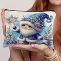 Detailed close-up of blue Christmas gnome printed on a durable linen makeup pouch - Blue Winter Gnome Flower Hat Style (TSND69-2)