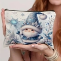Detailed view of linen Christmas gnome cosmetic pouch held by hand with snowflake print - Beige Blue Gnome Winter Elements Style (TSND69-3)