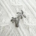 Silver palm tree pendant with sparkling pavé cubic zirconia on knit background - Coconut Tree (NAA08-7)