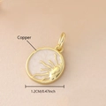 Detail macro view of golden copper sun pendant with 1.2cm diameter and white pearl center - Gold Plated Sun (NAK11-9)