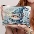 Blue Christmas gnome pattern linen cosmetic bag with zipper being held by hand - White Base Blue Hat Snowflake Berry Gnome Style (TSND69-9)