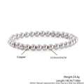Detail showing 6mm polished copper ball stretch bracelet with glossy silver mirror finish - 6mm Bead (NZ06-1)