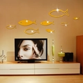 Adesivi murali specchio pesce 3D dorati in acrilico per decoro soggiorno moderno - Oro