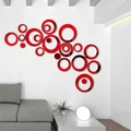 Detailed view of red 3D acrylic mirror wall stickers in a modern living room setting - Red