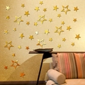Pegatinas de pared de espejo acrílico con forma de estrella dorada y diseños huecos - Dorado