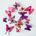 Set di 12 adesivi murali a farfalla 3D colorati con ali realistiche su sfondo bianco - Viola