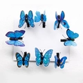 Set di otto fermagli per capelli a farfalla blu con motivi realistici su bianco - Blu