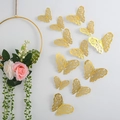 Set of 12 gold 3D hollow butterfly wall stickers with metallic texture for home decor - Gold (Style A)