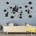 Macro view of 3D acrylic mirror fish wall stickers in a modern blue room setup - Black