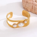 Detailed view of 18k gold plated stainless steel cuff bracelet with faux pearl inlays - Artificial Pearl Bangle (3264)