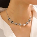 Detail of silver necklace featuring eight square black acrylic pendants on layered chain - Antique Silver Square Stone Necklace (27)