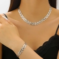 Polished silver layered rectangle link necklace and bracelet set on model - Silver Tone Bracelet And Necklace (5974/4925)