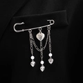 Detail of silver heart tassel brooch with pearls pinned on black suit lapel texture - White K 6992 (Heart Pearl)