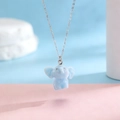 Close-up of fluffy blue flocked elephant pendant with fine silver-tone metal chain - Blue Little Elephant (04 White K S427)