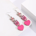 Detailed view of pink coffee cup and heart wooden dangle earrings with leopard hand charm - Peace Sign and Coffee Cup (12050)