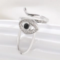 Macro detail of Evil Eye nail ring with silver plating, black gem and pavé cubic zirconia - Evil Eye (2868) / White Gold