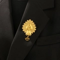 Elegant gold eye-shaped heart brooch displayed on a black blazer with artistic detailing - Baroque Eye Heart Style (8098)