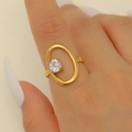 Elegant gold-plated stainless steel ring with oval frame and sparkling cubic zirconia - Oval Hollow Eccentric Round Zircon Gold Style (1599)