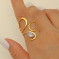 Minimalist gold-plated open ring featuring a marquise-cut zircon and sleek curved design - Marquise Hollow Streamline Gold Style (12105)