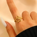 Elegant gold flower ring featuring a white pearl center on a layered petal design - Hollow Clover Pearl Layered Style (1984)