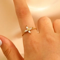 Elegant gold flower ring with marquise-cut zircons on a delicate twisted band - Four-petal Flower Marquise Zircon Twisted Rope Style (12214)