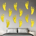 Macro detail of 3D acrylic mirror footprint wall stickers for home decor - Gold Footprint (JM508)
