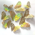 Adesivi murali farfalla 3D dorati traforati con trama metallica iridescente - Modello A Oro Laser