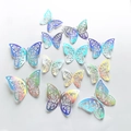 Set di 12 adesivi murali a farfalla 3D traforati iridescenti con effetto laser metallico - Stile I / Argento Metallico