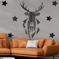 Black acrylic geometric deer head and stars mirror wall sticker in a modern living room - Black