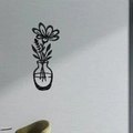 Detailed shot showing the 3D depth and finish of the black acrylic floral wall decal - Style B / Black