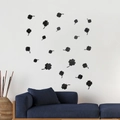 Detailed view of 3D black clover acrylic wall stickers in a modern living room setting - Black