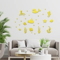 Detailed view of yellow acrylic mirror ocean animal wall stickers in a modern living room - Gold