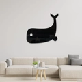 Detail of whale shaped black acrylic mirror wall sticker in a modern living room - Black