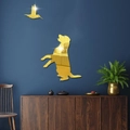 Golden mirror wall stickers featuring a cute dog and hummingbird on a dark blue wall - Gold