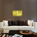 Artistic gold film roll mirror wall sticker in a modern living room setting - Gold