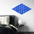 Detail of blue triangular mirror wall stickers arranged in a geometric diamond pattern - Blue