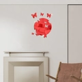 Modern red acrylic butterfly mirror wall stickers displayed in a contemporary living room decor - Red