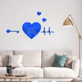 Blue 3D mirror wall sticker set with heart, key and heartbeat waveform on a beige wall - Blue