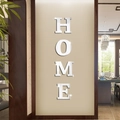 Silver mirror acrylic HOME letter wall stickers on a modern wood frame background - Silver