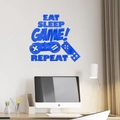 Detail view of blue acrylic mirror wall sticker with game controller and game text - Blue