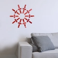 Modern red acrylic mirror wall stickers in a sunburst pattern for living room decor - Red
