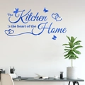 Sticker mural miroir bleu avec citation The Kitchen is the heart of the Home et papillon - Bleu