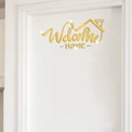 Sticker mural miroir doré Welcome Home avec contour de maison sur un mur blanc - Doré