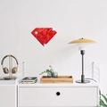 Modern red diamond mirror wall sticker decorating a white wall in a cozy bedroom setting - Red