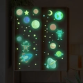 Stickers muraux espace phosphorescents avec astronautes et planètes pour enfants - Vert