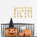 Set mit 26 gelben Acryl Alphabet Wandstickern mit Katzensilhouetten für die Deko - Gold