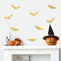 Adesivi murali pipistrello 3D dorati per decorazioni di Halloween su camino bianco - Oro