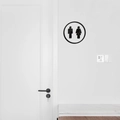 Insegna per toilette circolare in acrilico nero minimalista con icone su muro bianco - Nero