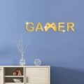 Adesivo murale 3D GAMER in acrilico dorato con icona controller M per arredamento gaming - Oro